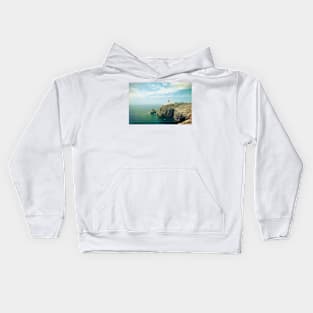 Lighthouse on top of a cliff Kids Hoodie